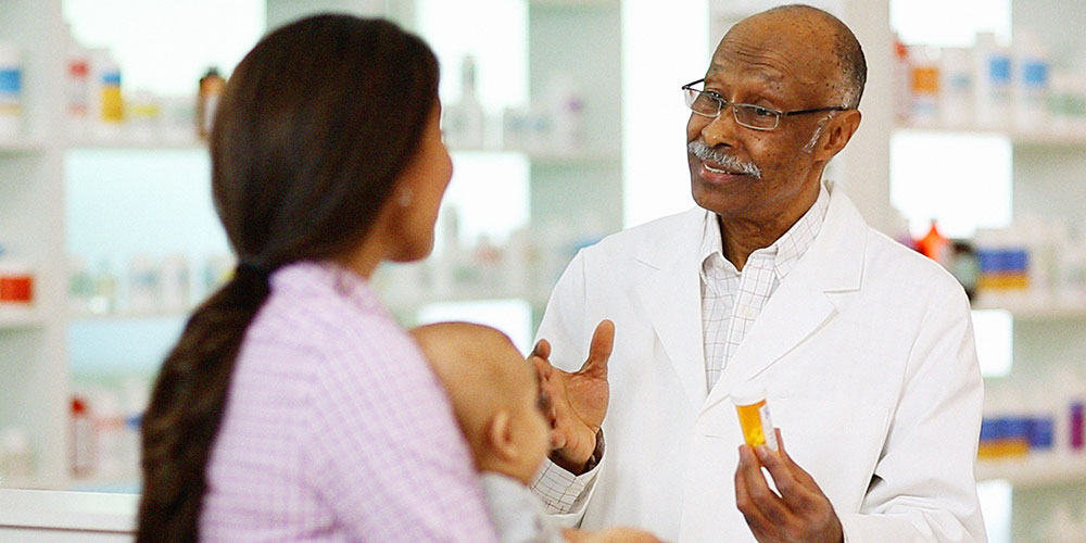 physician talking to customer about prescription